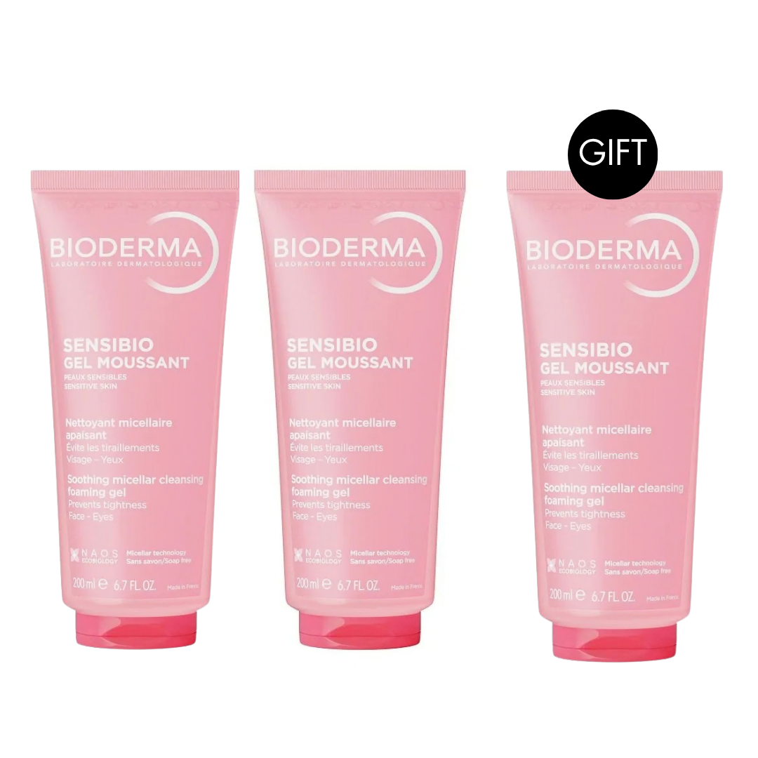 Three pink Bioderma Sensibio Gel Moussant foaming gel tubes arranged side by side on a white background, with a black circular 'GIFT' badge in the top right corner.